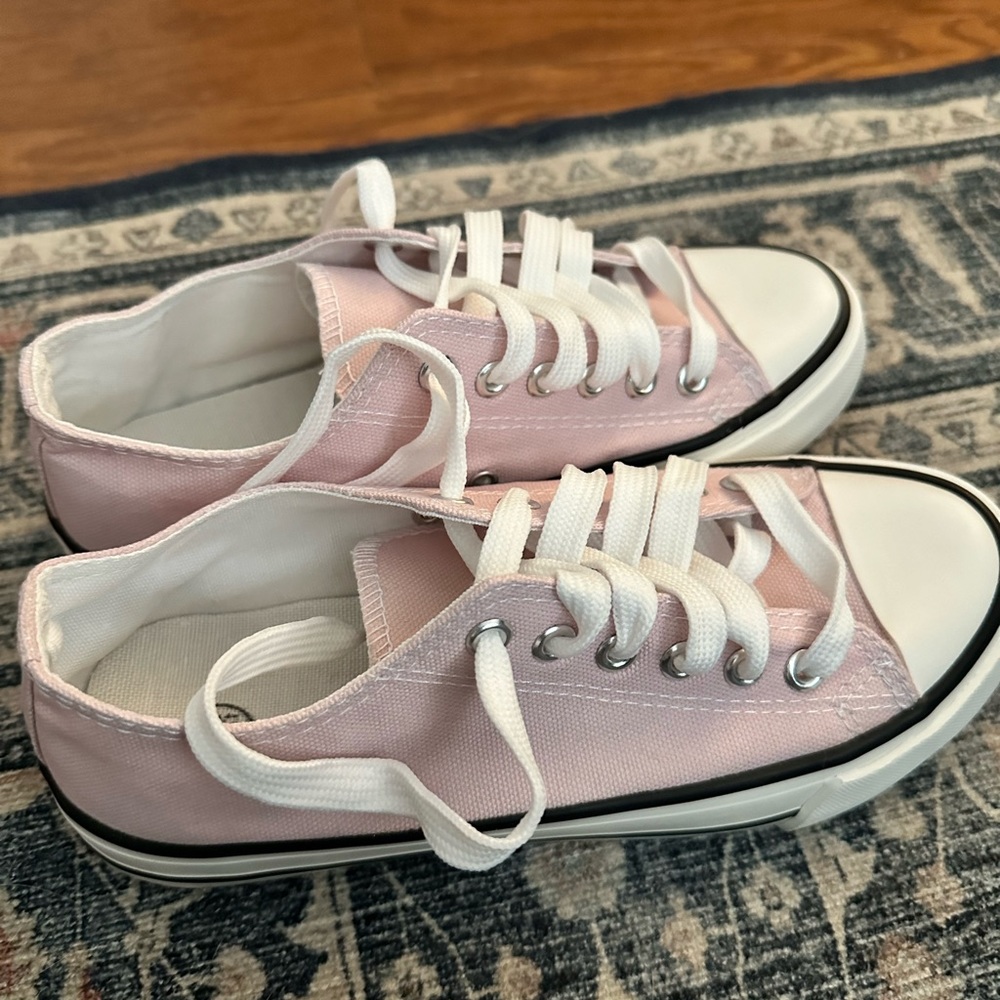 Pink shoes, never worn. Says 6.5 but fits 5.5.